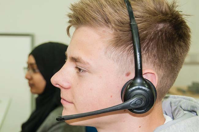 Student using microphone with a PC